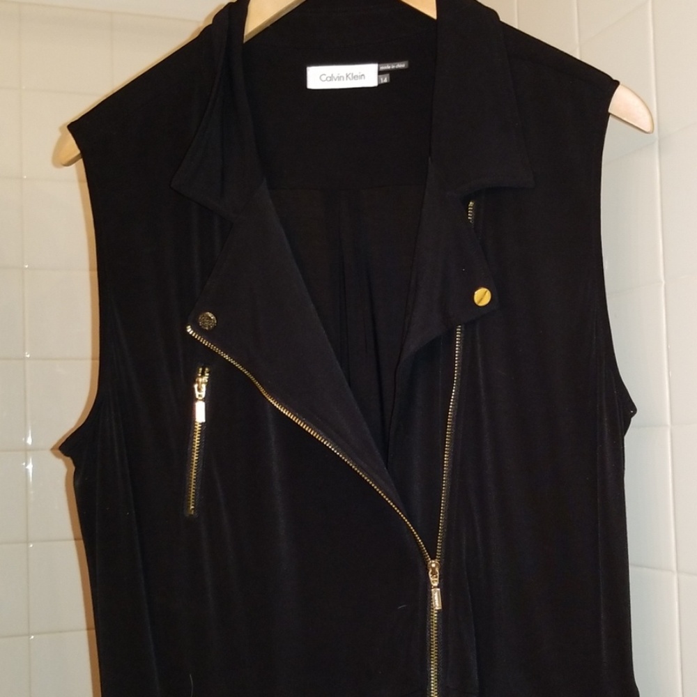A black sleeveless jumpsuit.